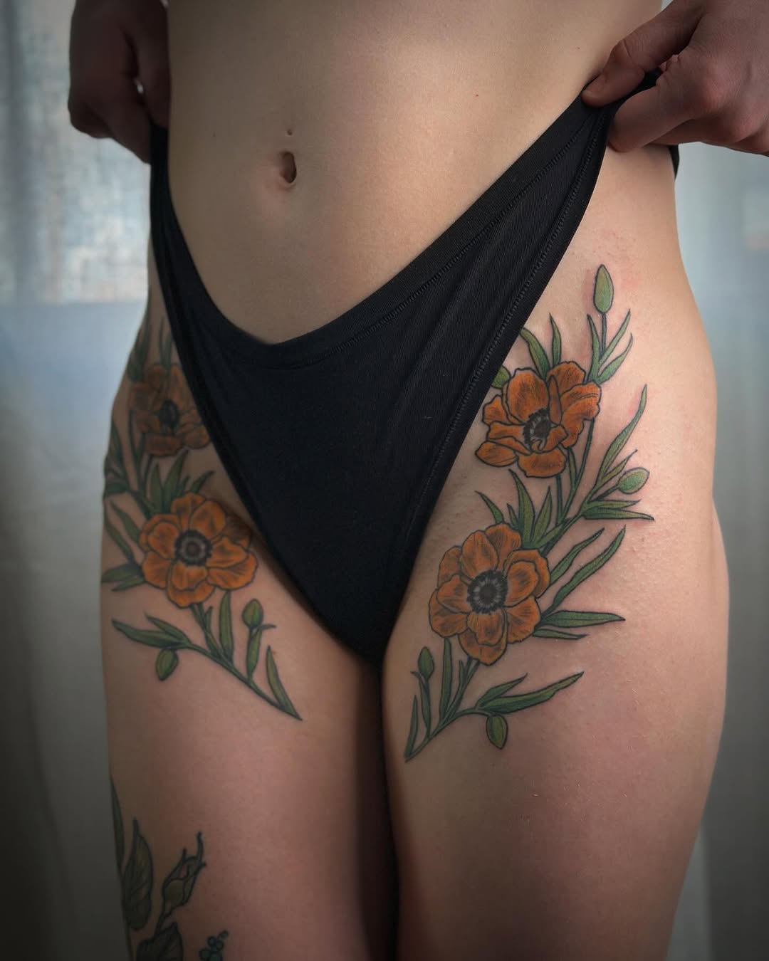 Vibrant floral hip tattoo art