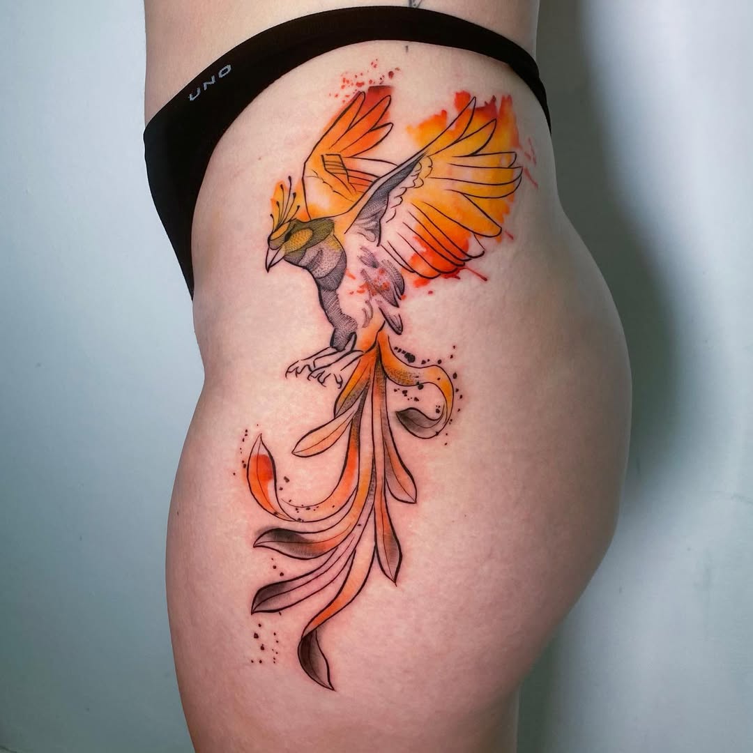 Vibrant phoenix tattoo with flowing elements