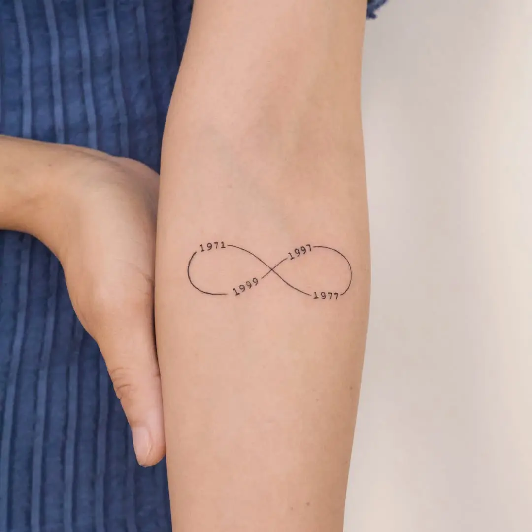 Personalized infinity tattoo with significant dates