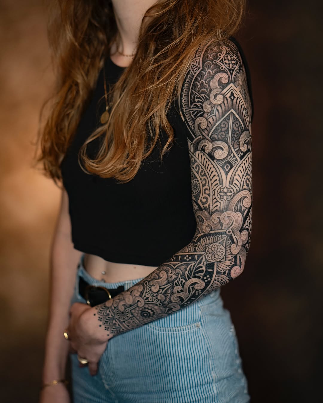 Elegant black and grey floral sleeve tattoo