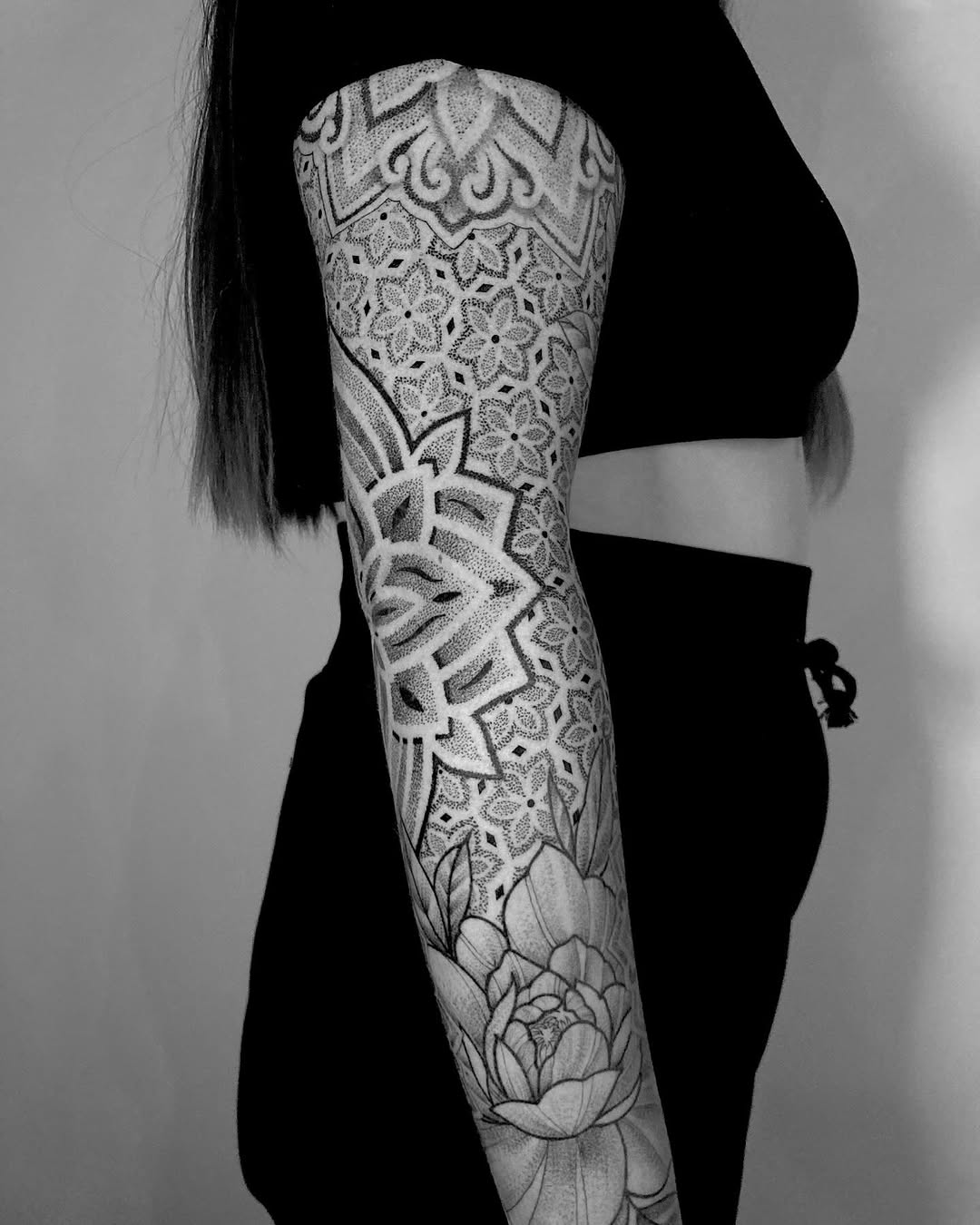 Intricate floral and geometric sleeve design