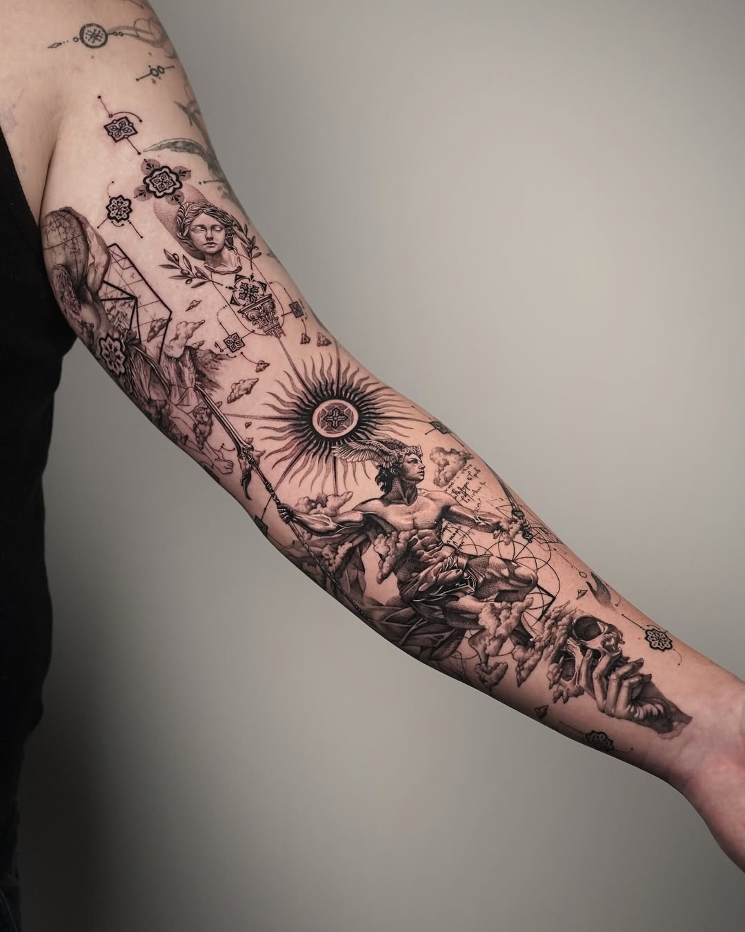 A cosmic journey through sleeve tattoo artistry