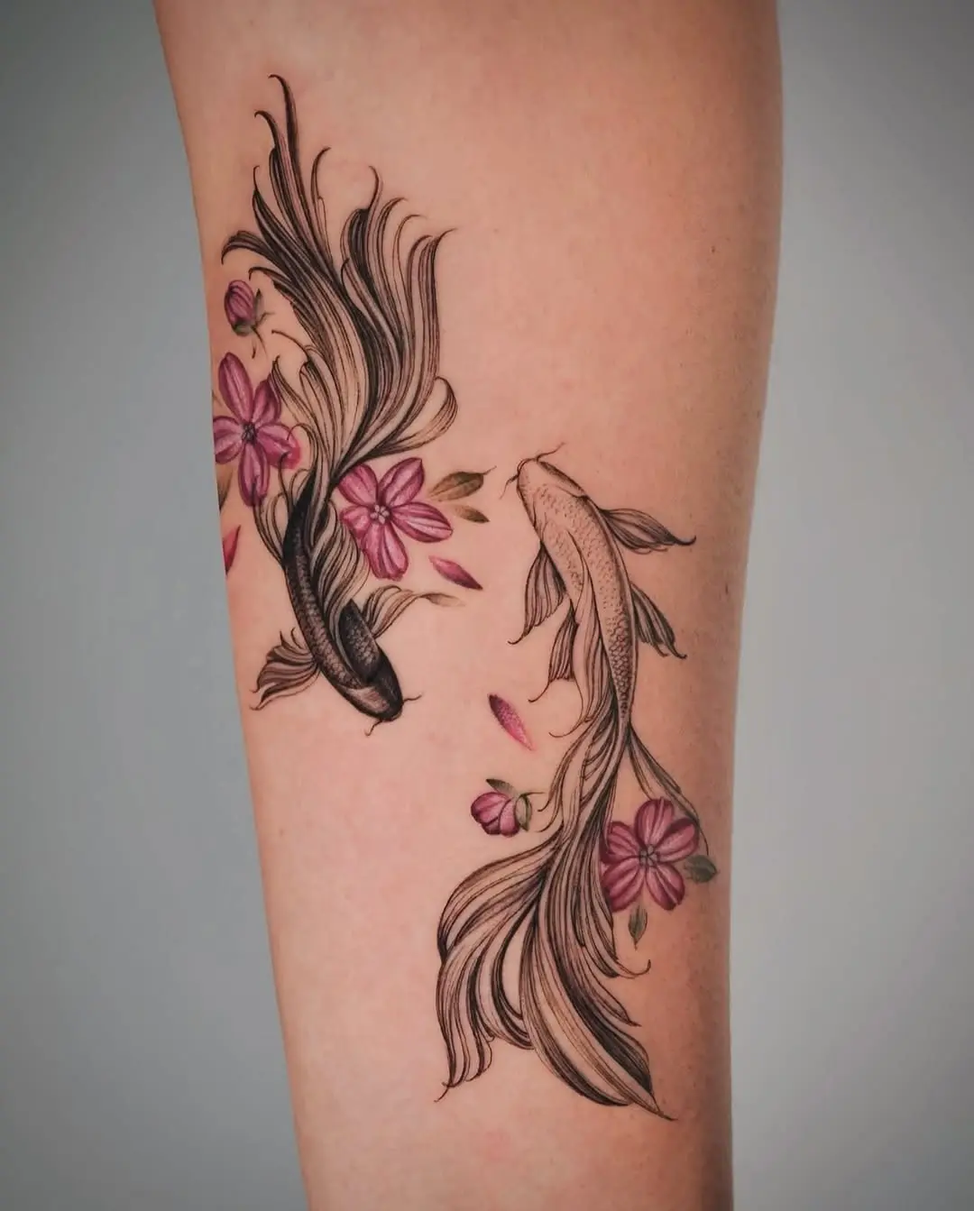 Elegant koi fish with floral accents design