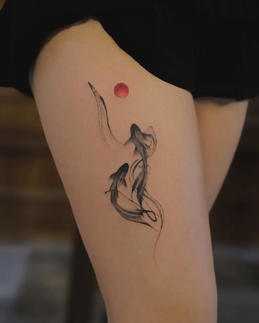 Elegant Koi Fish Tattoo with Red Sun