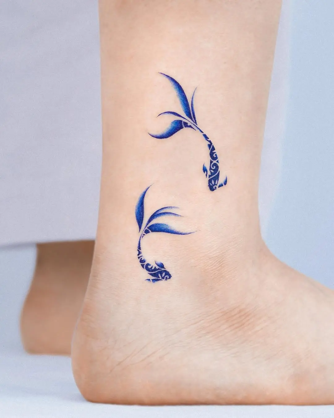 Elegant Blue Koi Fish Tattoos Perfect for Ankle
