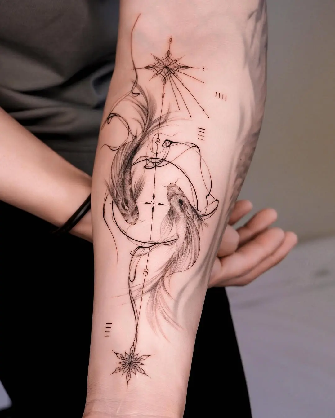 Elegant Minimalist Koi Fish Tattoo Design