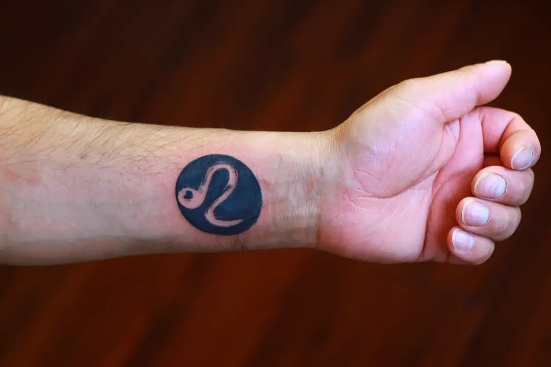 Bold Leo Symbol Tattoo on the Wrist