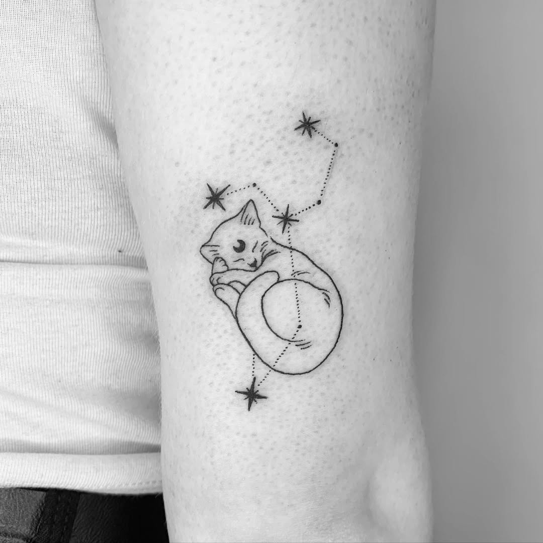 Adorable cat tattoo with Leo constellation