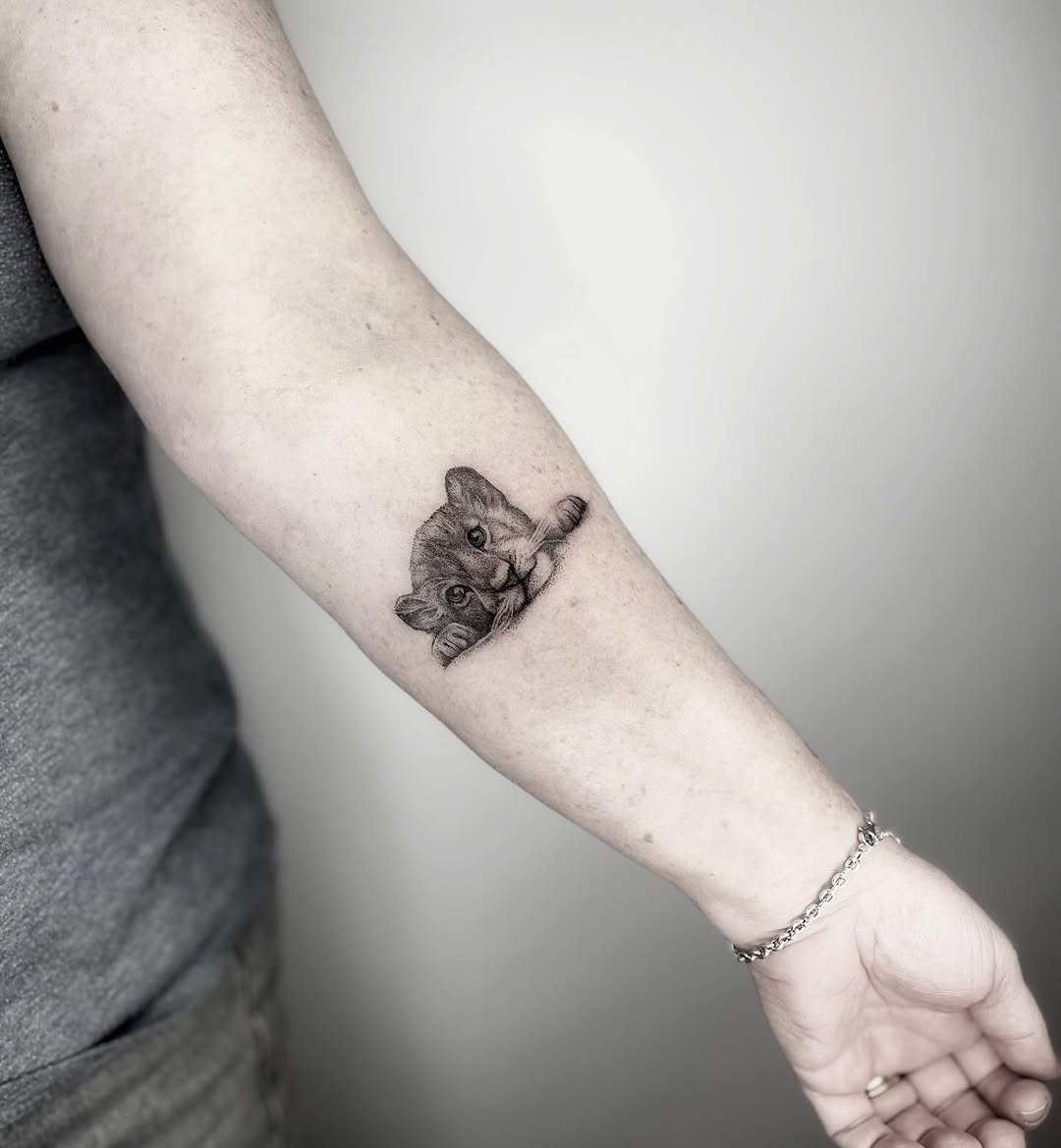 Charming Leo Tattoo with Playful Cat Design