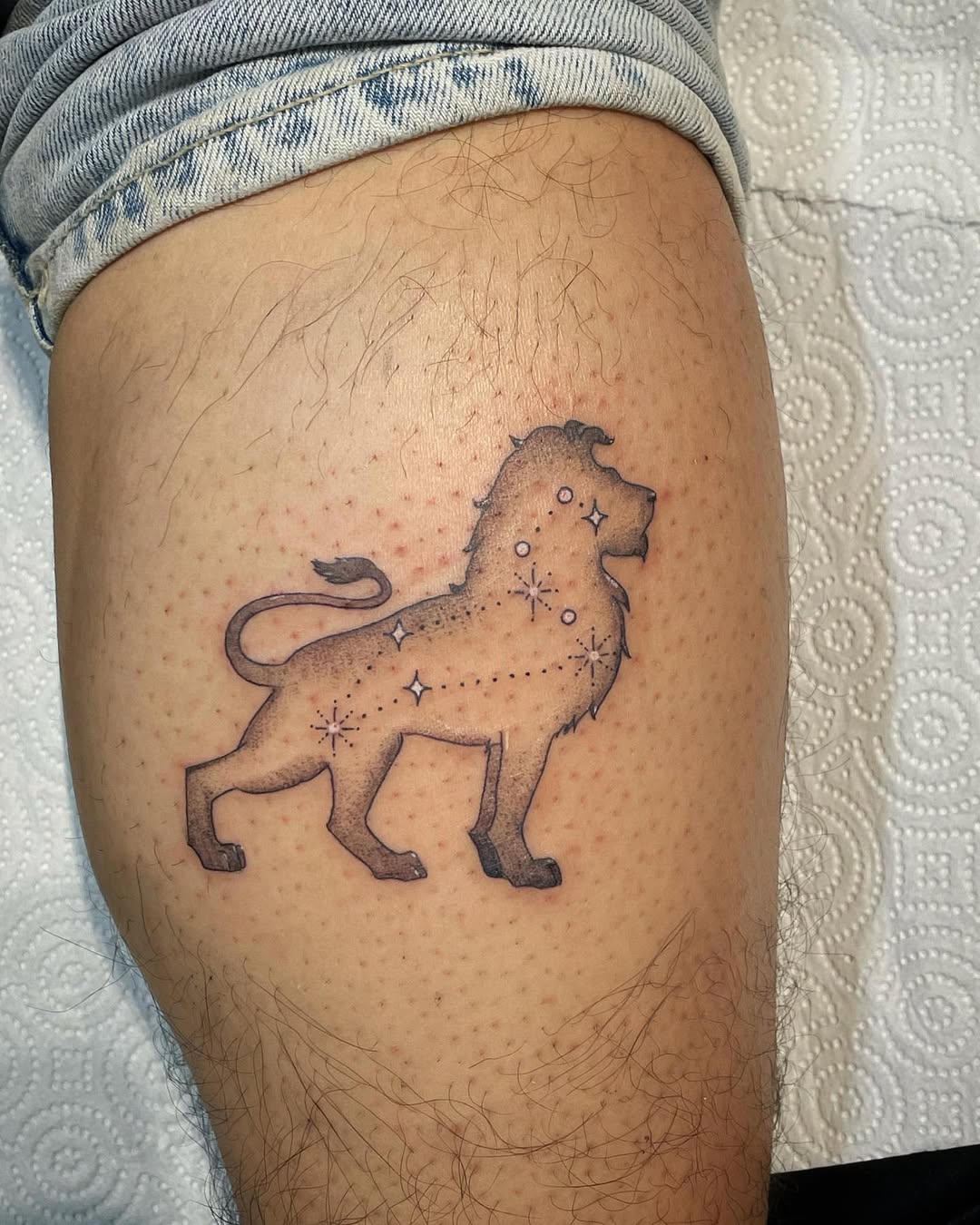 Striking Leo Tattoo with Constellation Detail