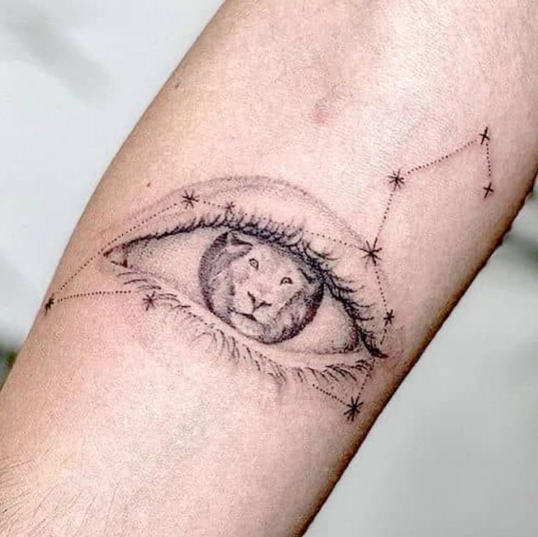 Mystical Lion Eye Tattoo Design Inspiration