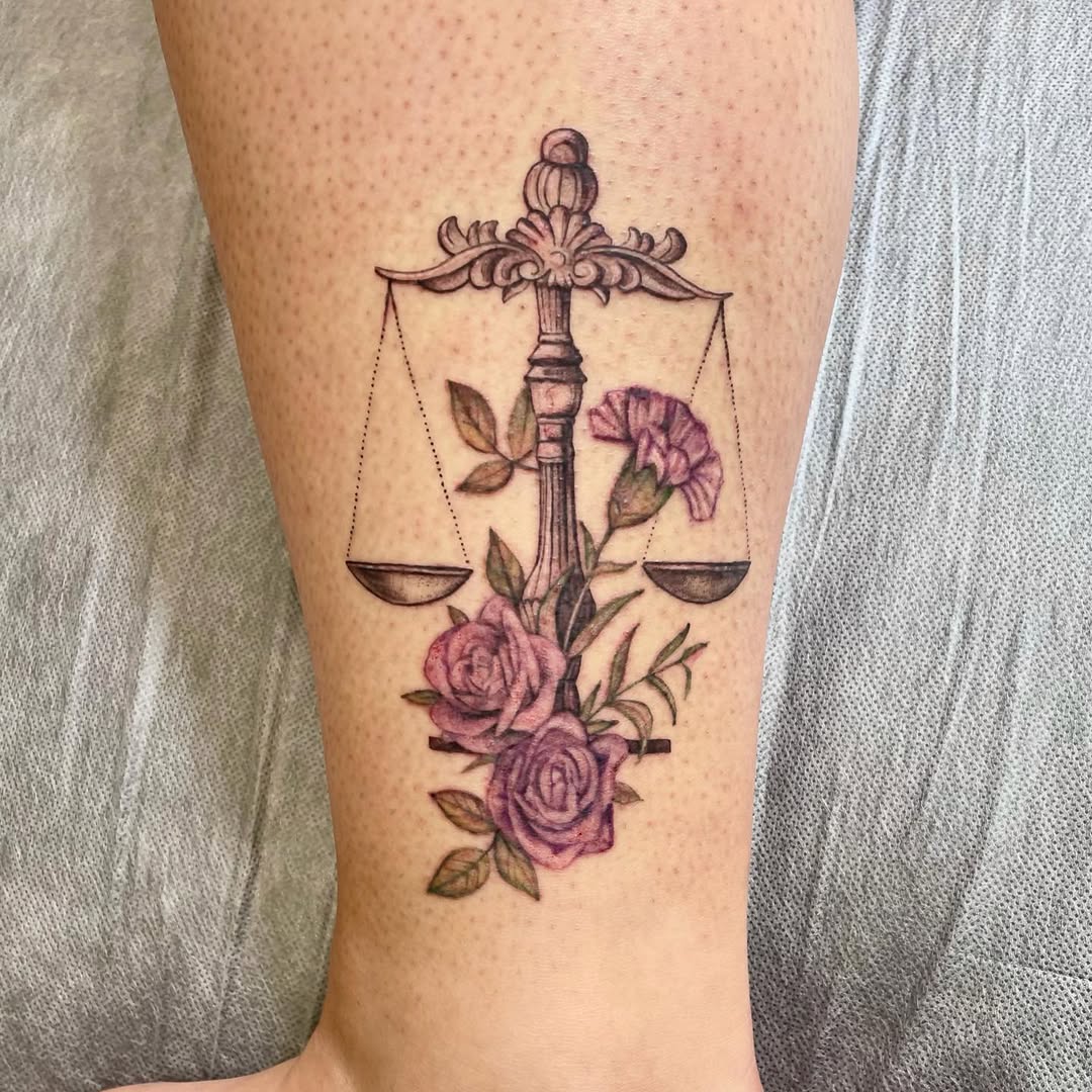 Symbolic Libra Tattoo with Floral Elements