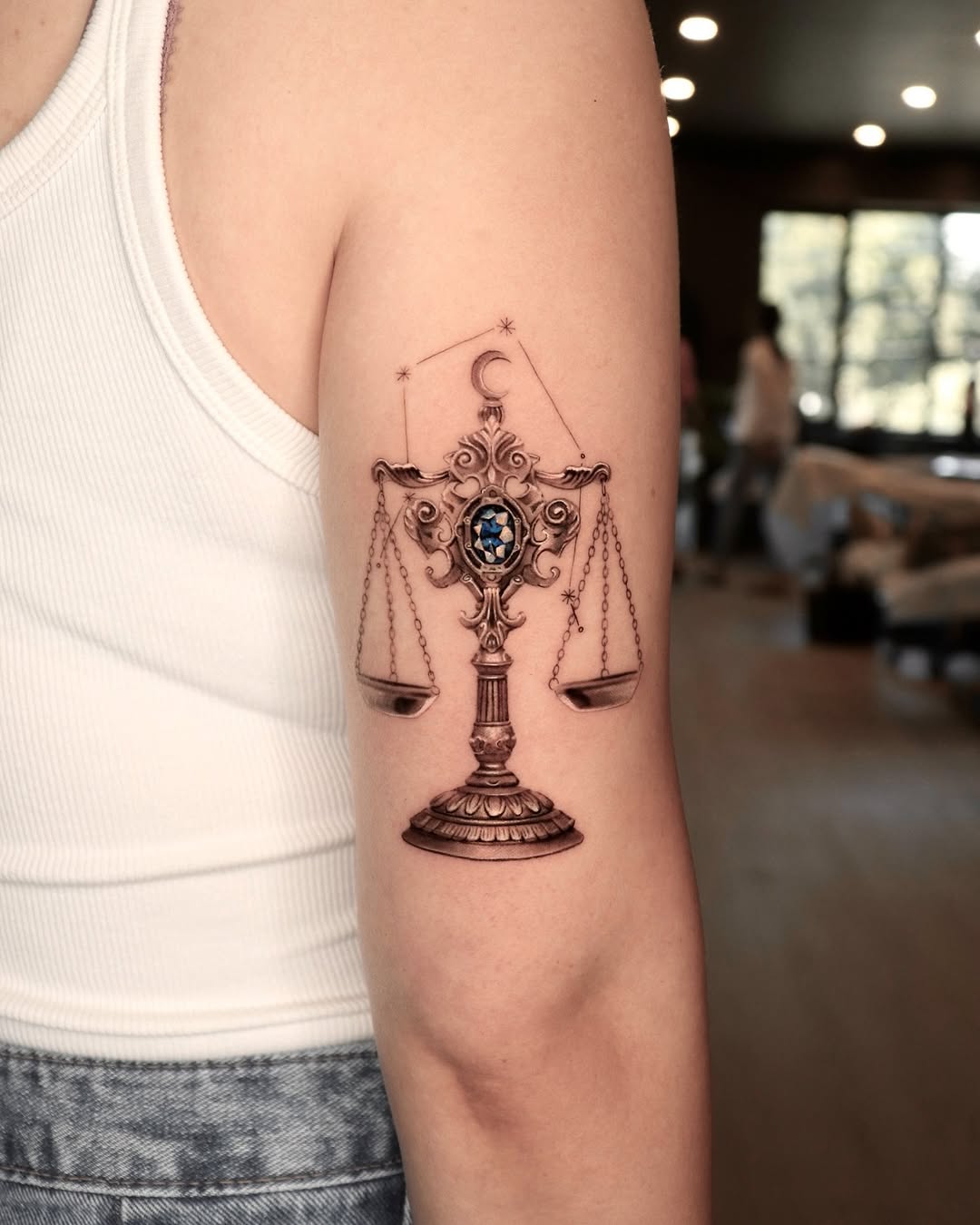 Elegant Libra Scale Tattoo with Mystical Elements