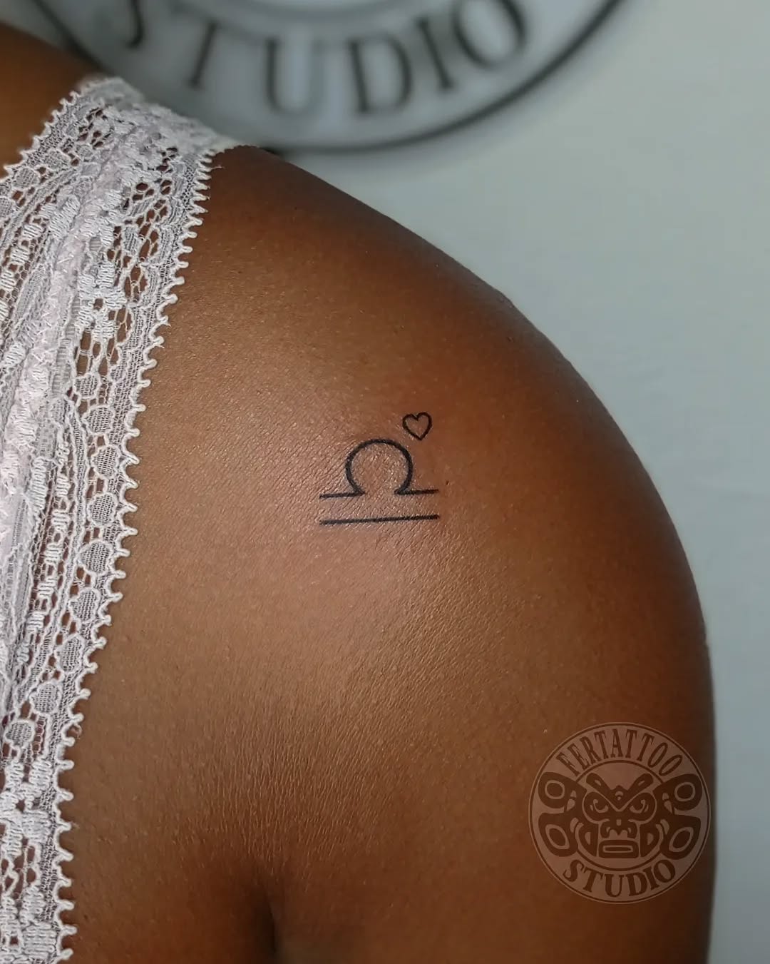 Elegant Libra Tattoo with a Heart Accent