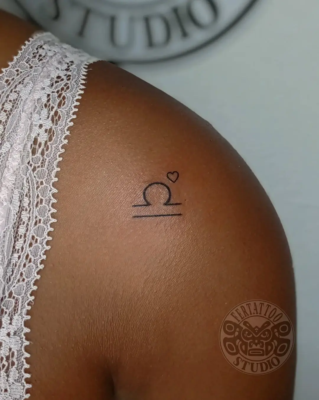 Elegant Libra Tattoo with a Heart Accent