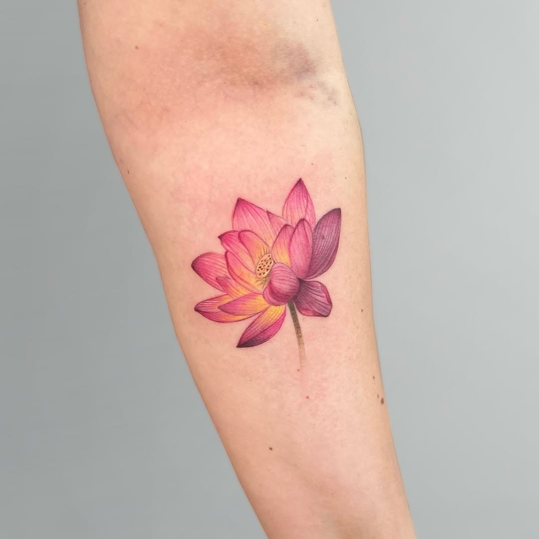 Vibrant lotus tattoo with intricate detailing