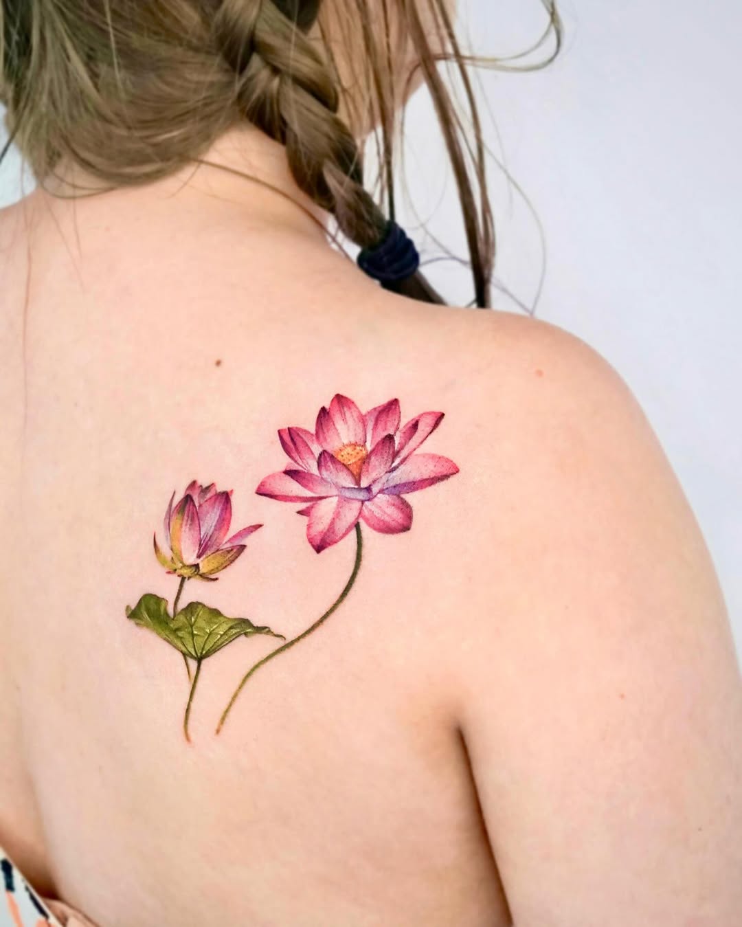Stunning lotus tattoo showcasing vibrant colors