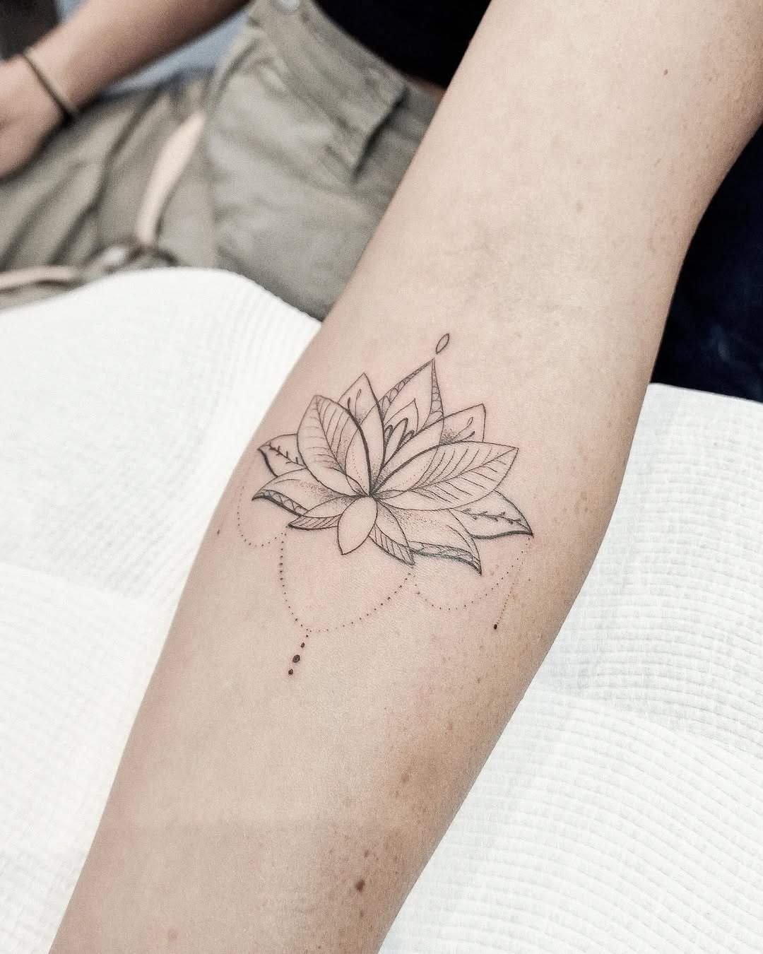 Elegant lotus tattoo with intricate details