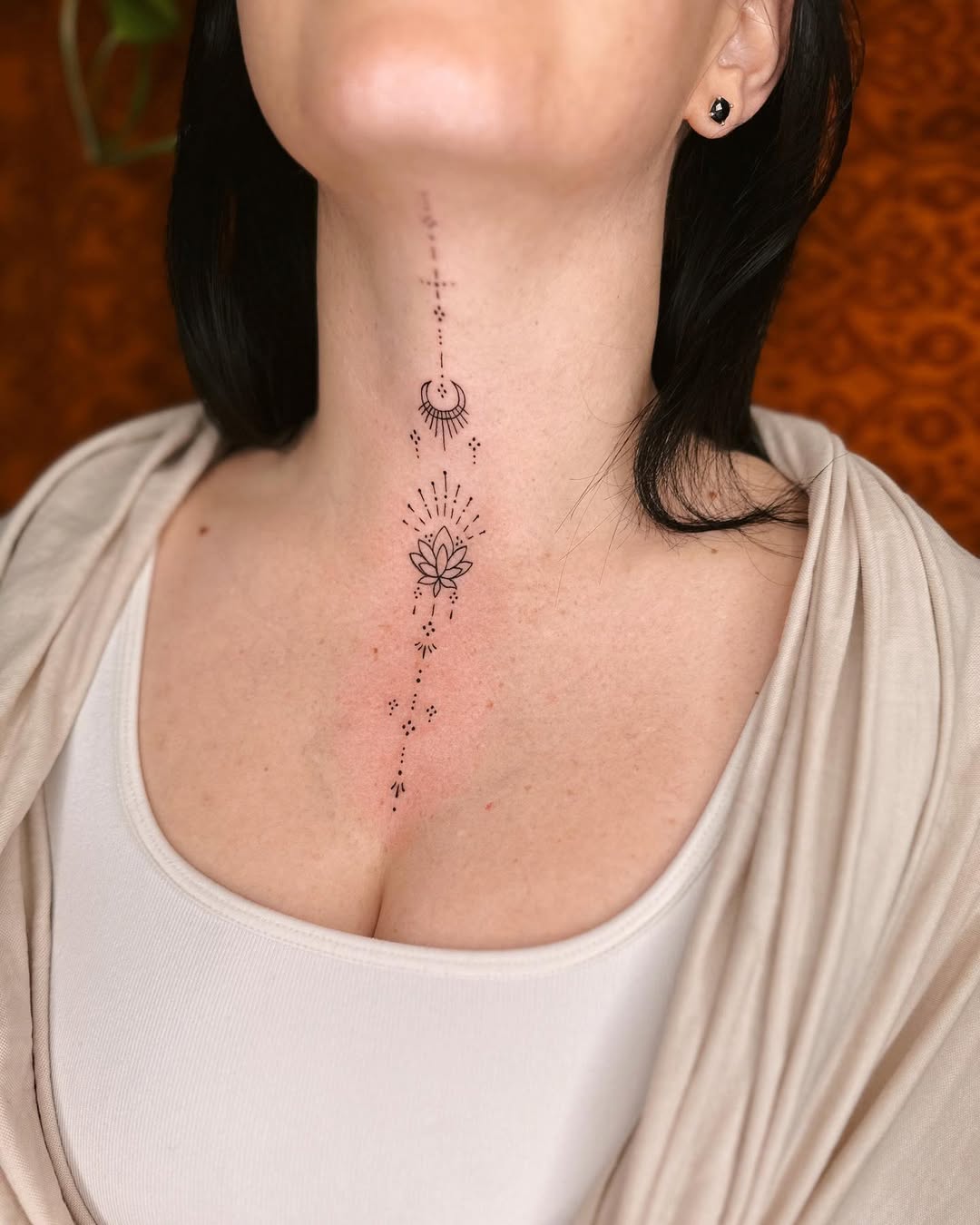 Elegant lotus tattoo design along the neck