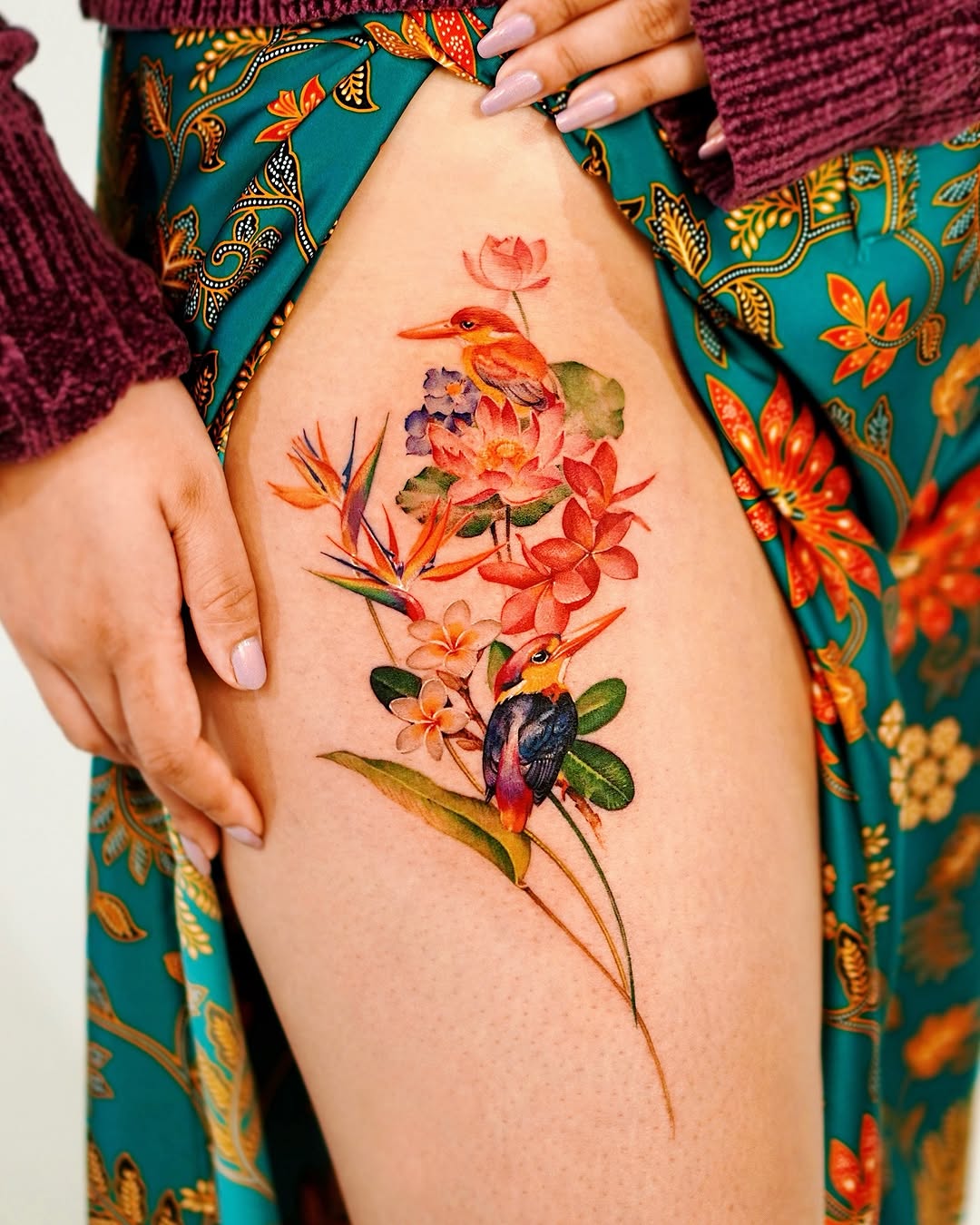 Vibrant floral lotus tattoo with vivid colors