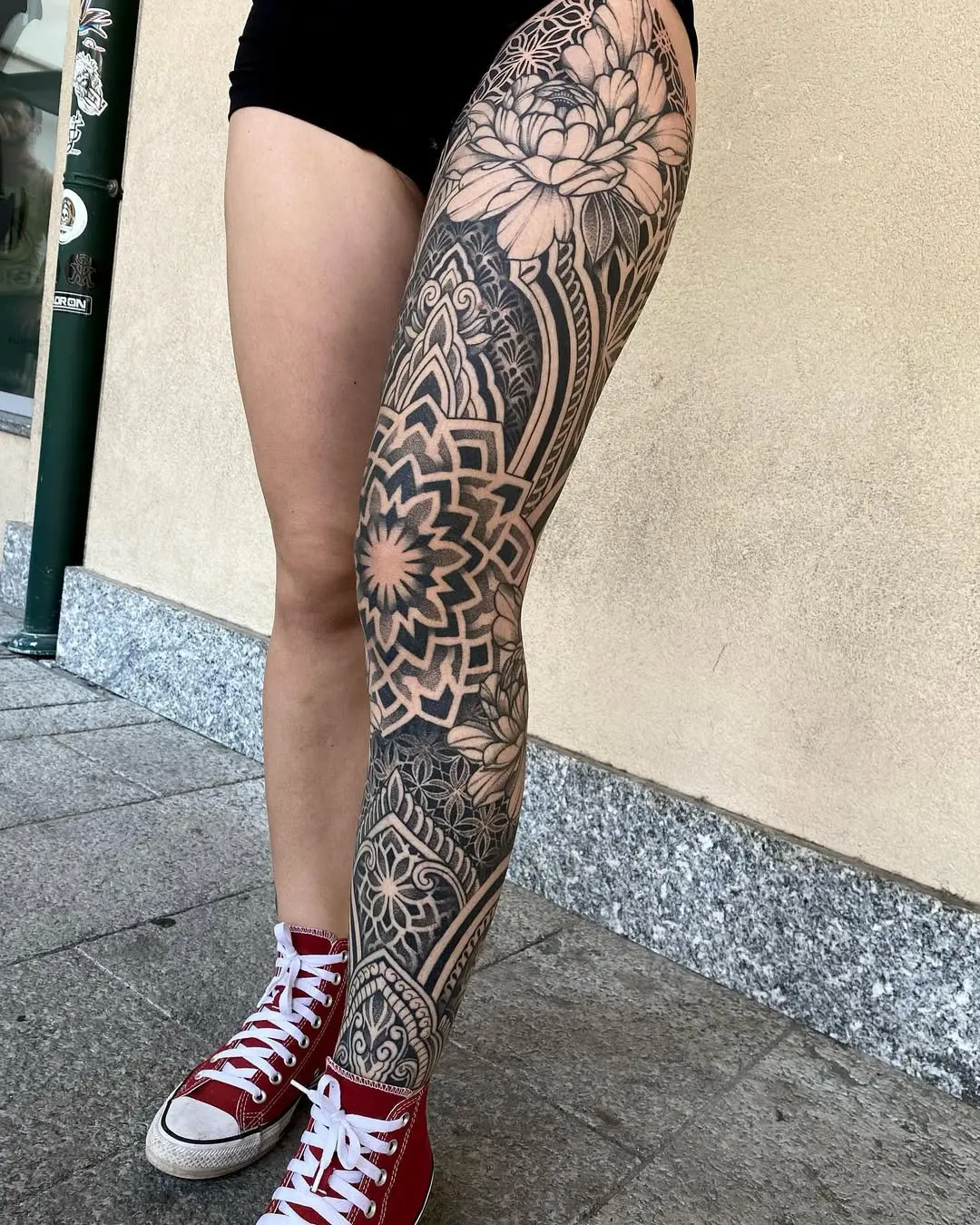 Intricate mandala tattoo on a leg