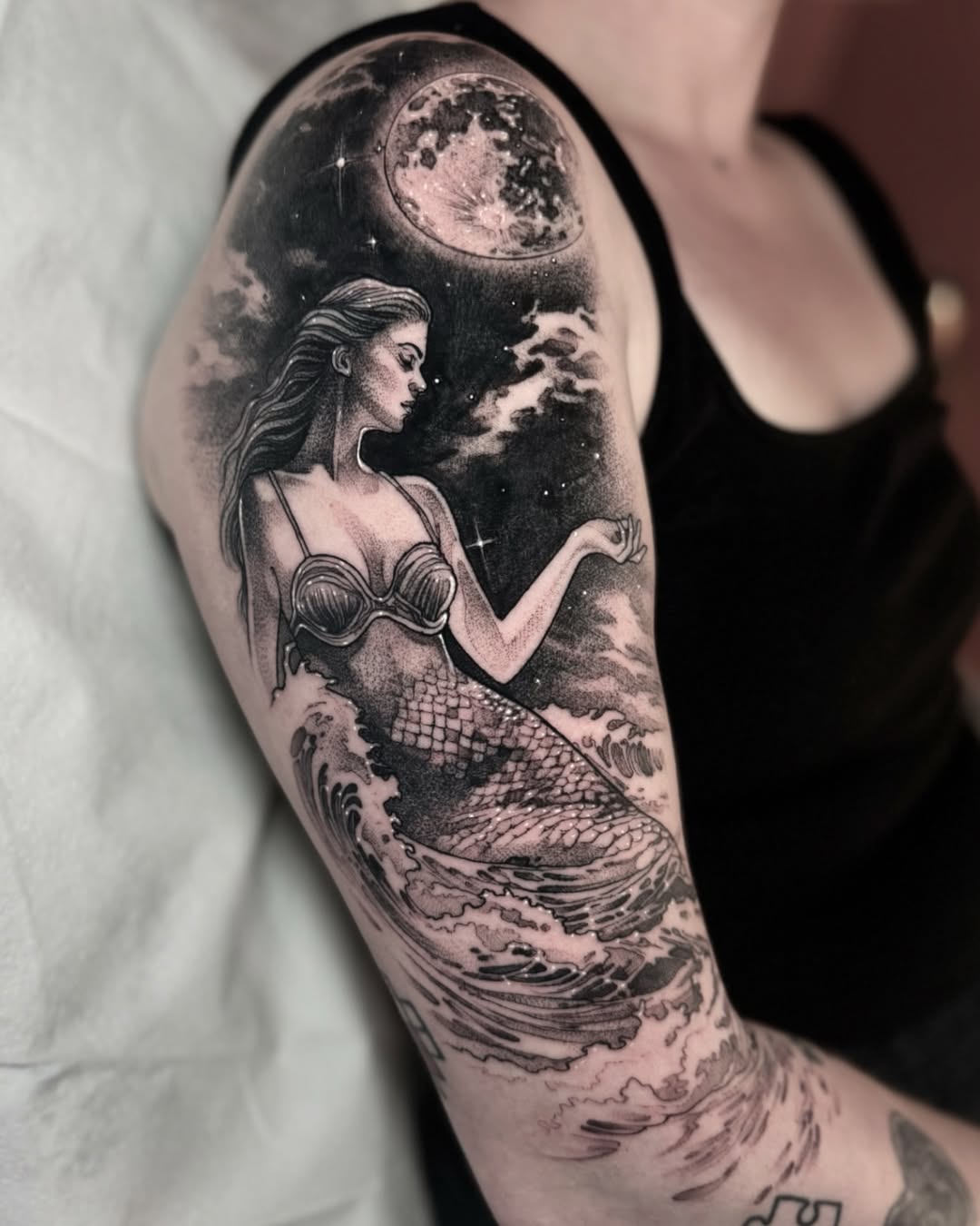 Ethereal Mermaid Tattoo with Celestial Elements