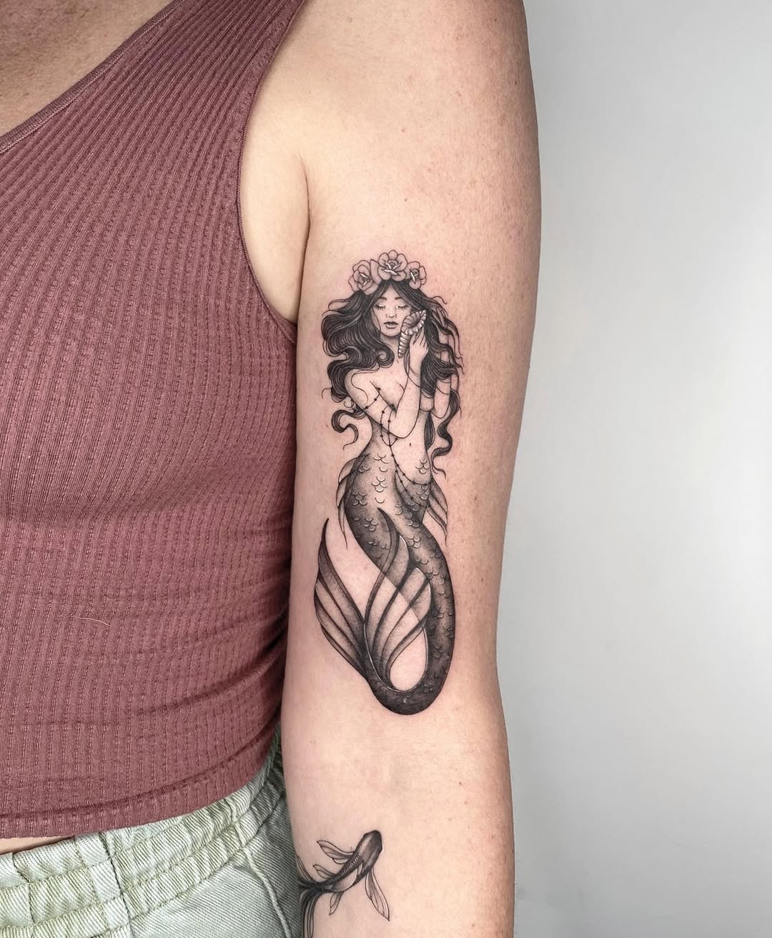 Artistic black and gray mermaid tattoo design