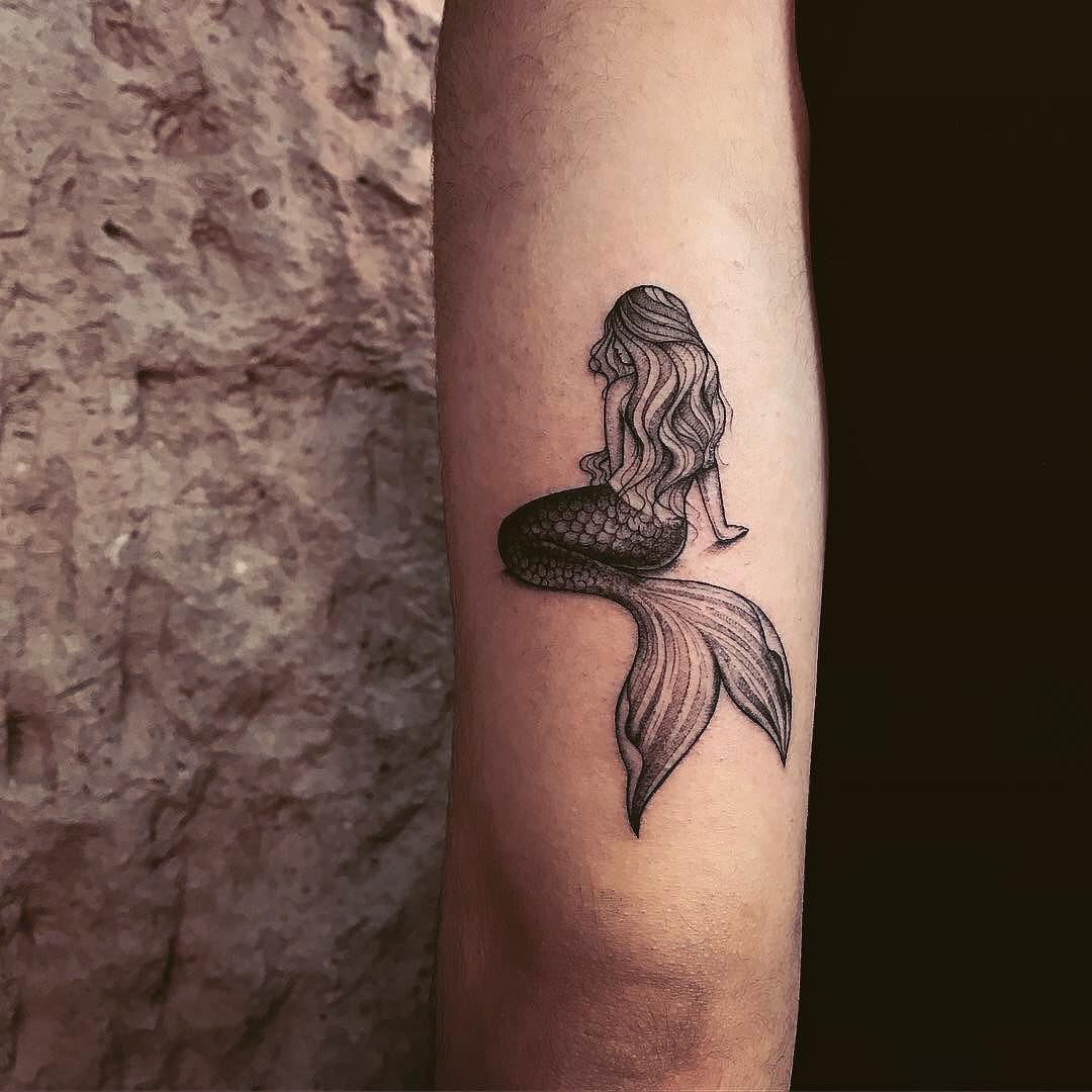 Elegant Mermaid Tattoo Portraying Ocean Mystique