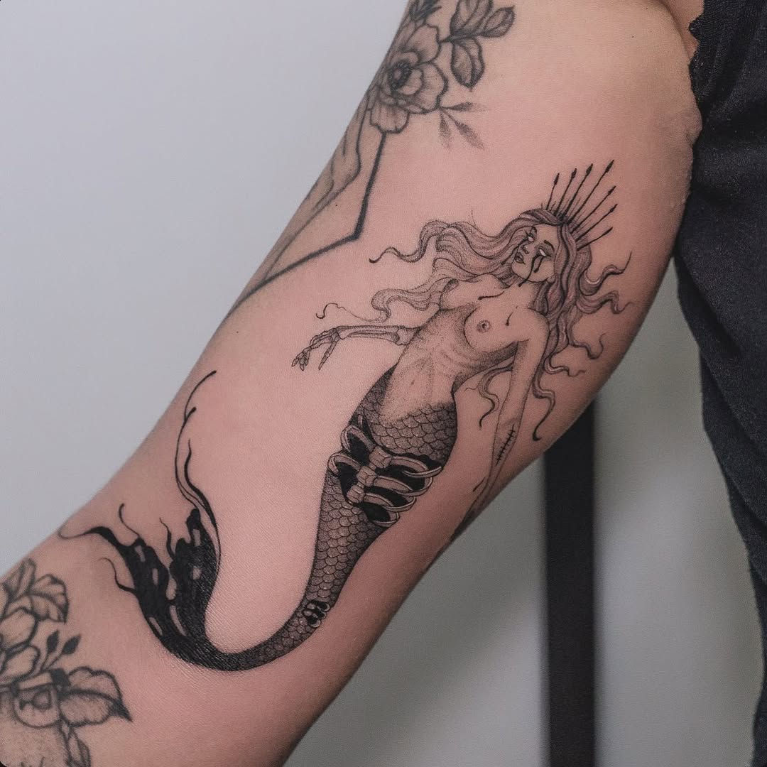 Elegant Siren Tattoo in Monochrome Ink