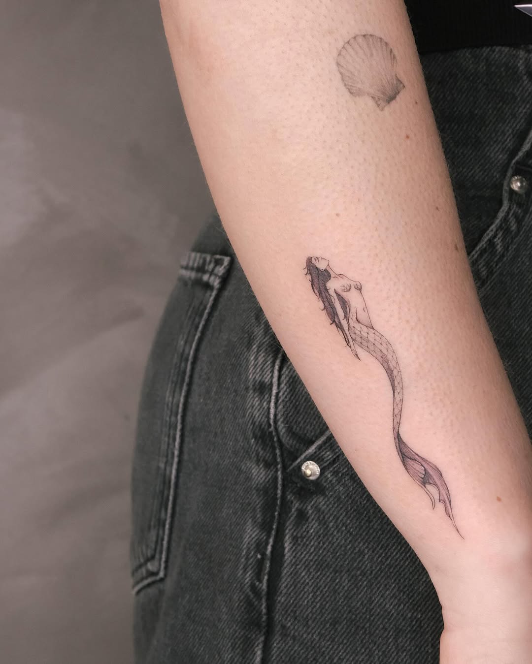 Elegant Mermaid Tattoo With Flowing Hair