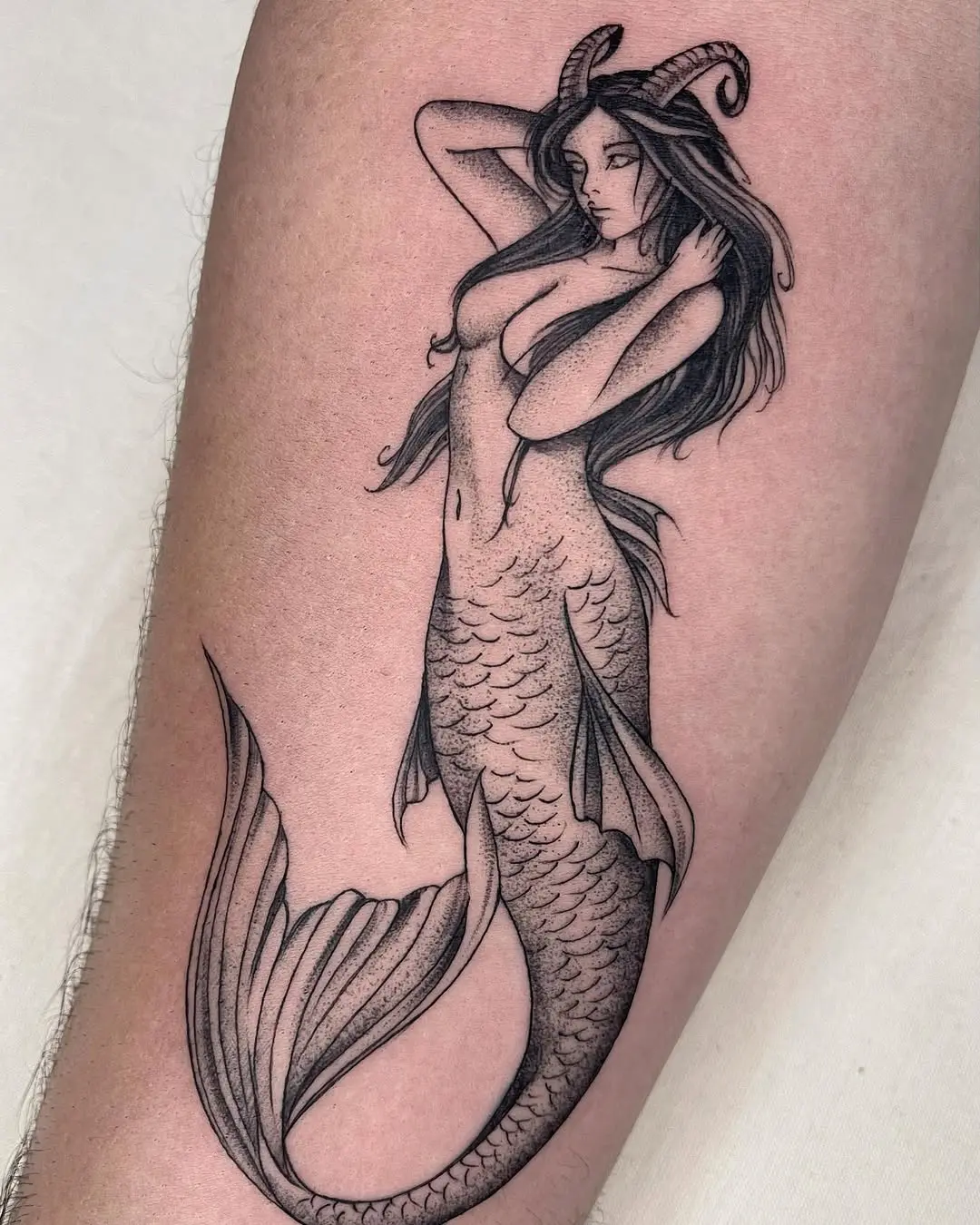 Stunning Mermaid Tattoo with Intricate Details