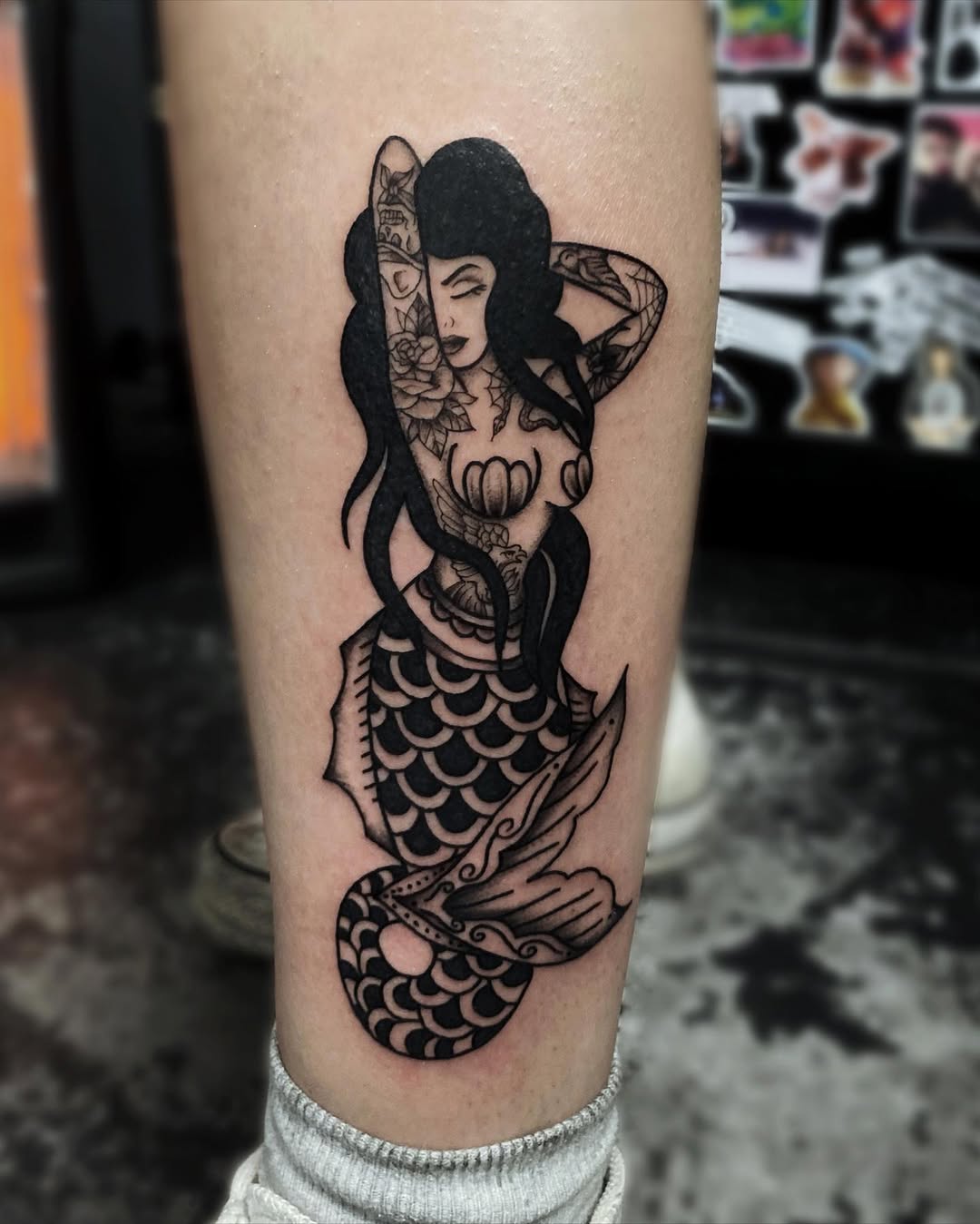 Stunning Mermaid Tattoo with Intricate Details