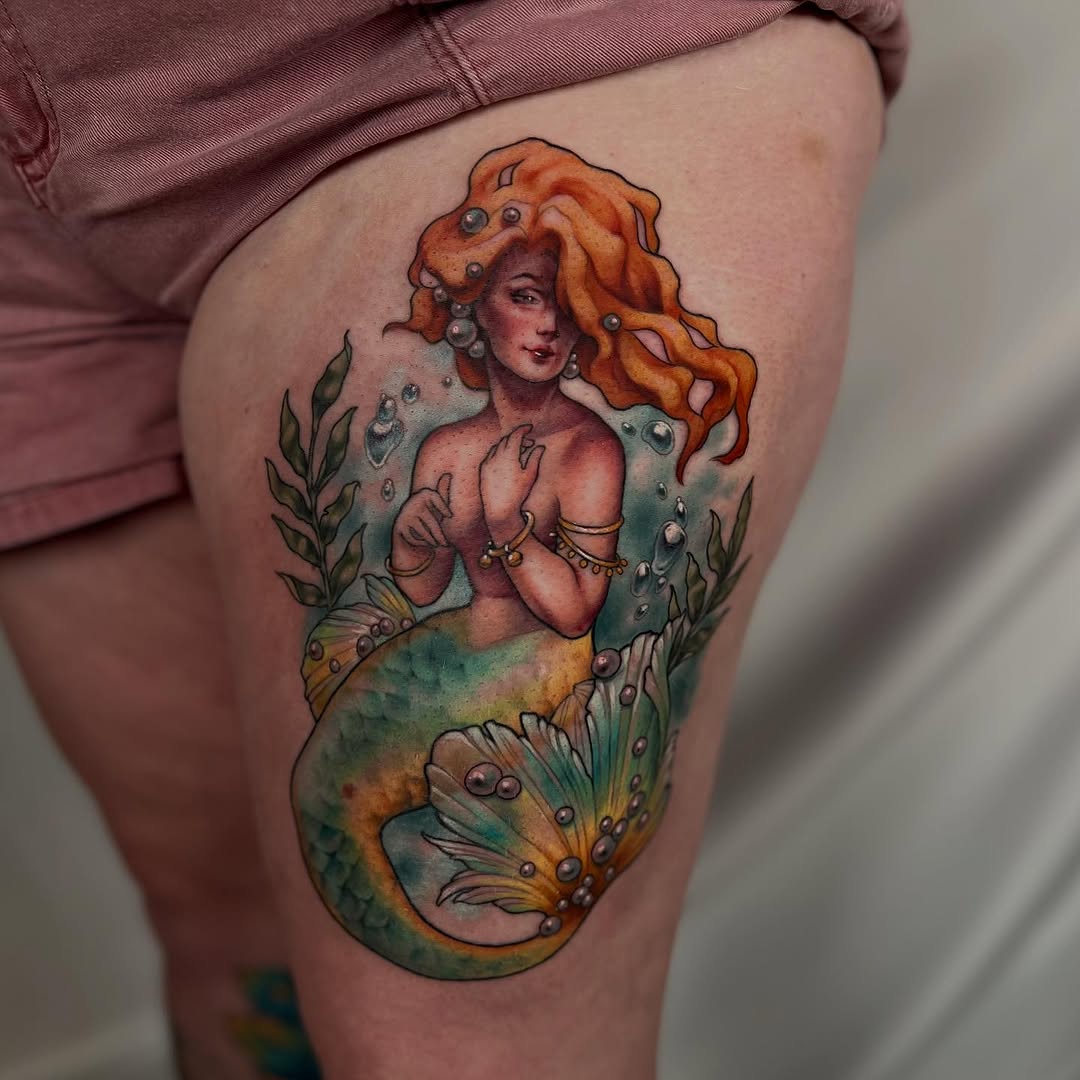 Colorful mermaid tattoo with enchanting ocean vibes