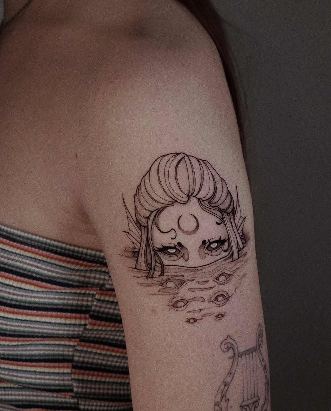 Intricate Mermaid Tattoo with Ethereal Vibes