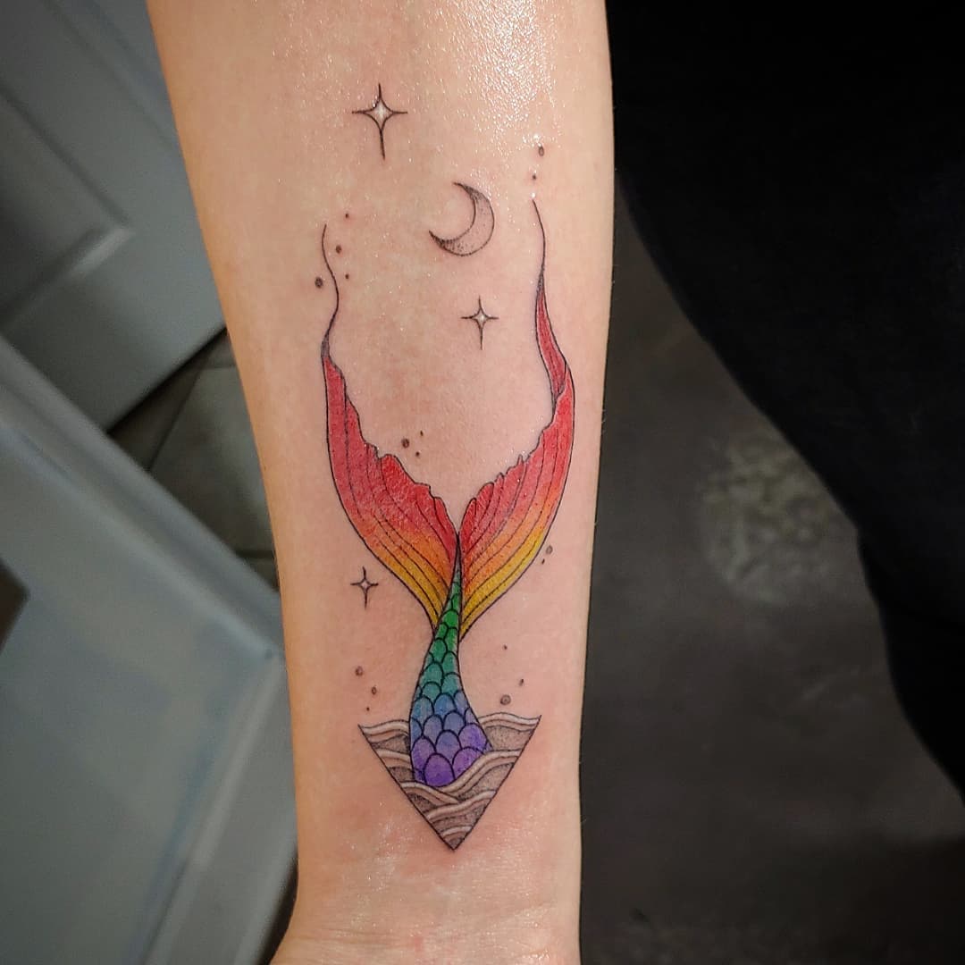 Colorful Mermaid Tail Tattoo with Celestial Elements