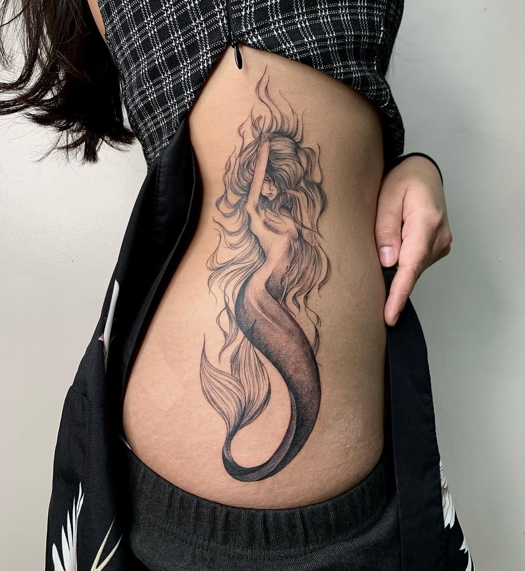 Siren tattoo showcasing enchanting ocean vibes