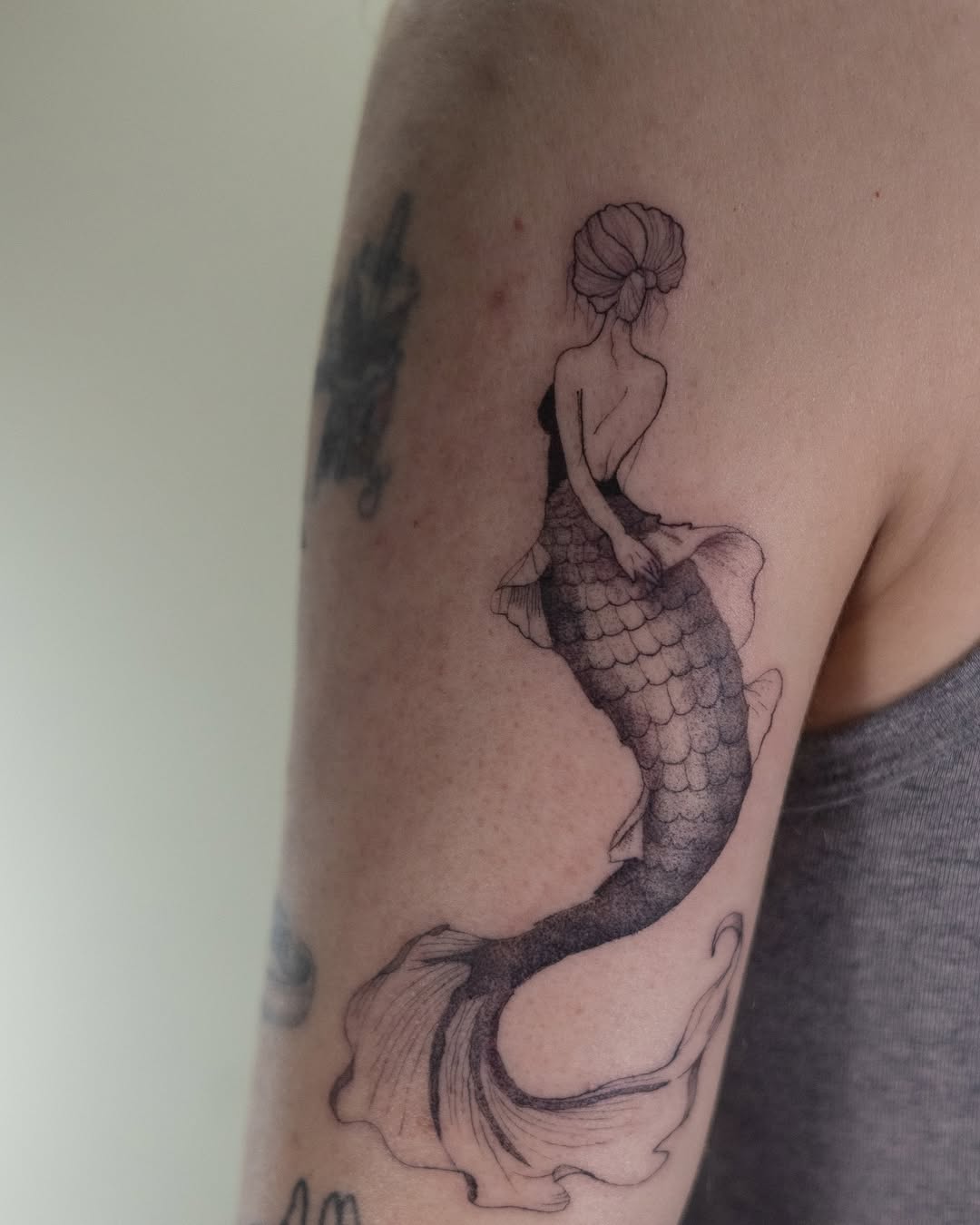 Elegant Mermaid Tattoo on Skin