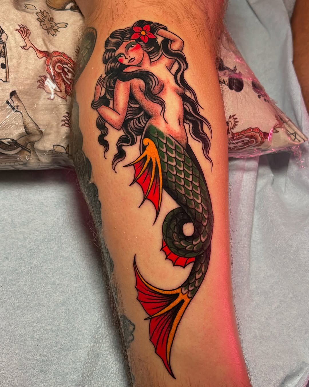 Vibrant Mermaid Tattoo on Forearm