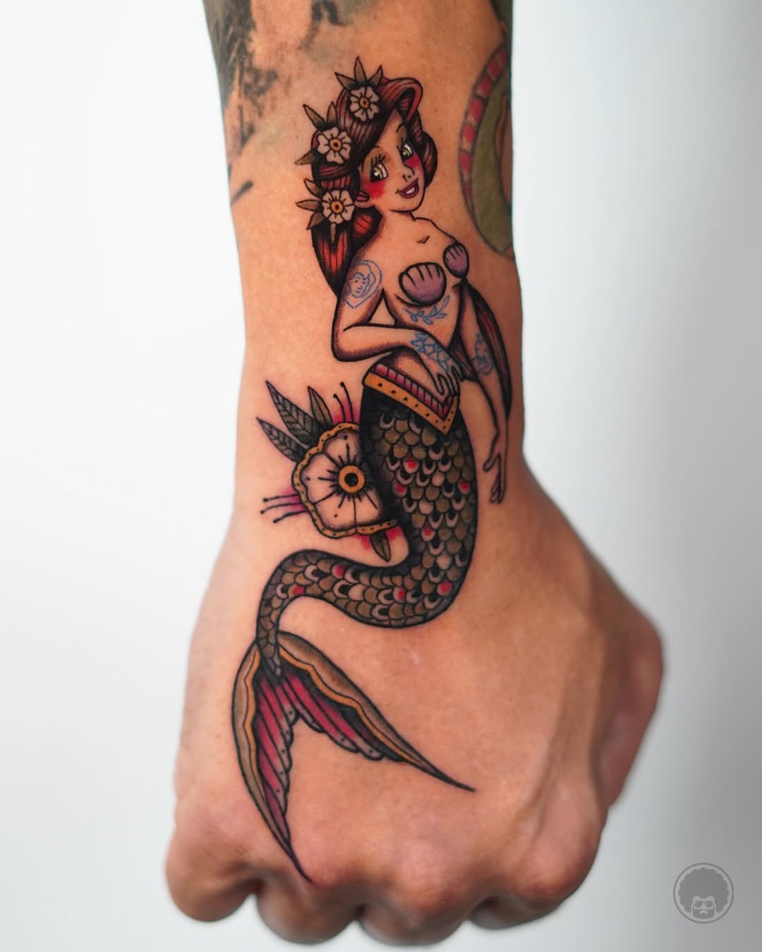 Colorful Mermaid Tattoo with Nautical Elements