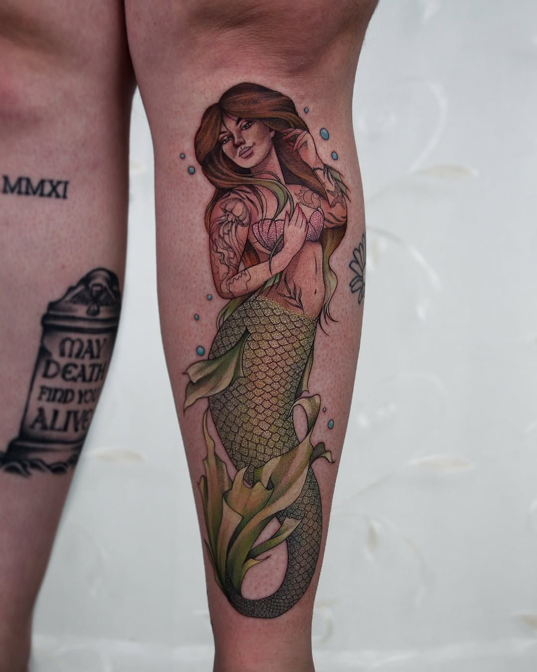 Stunning Mermaid Tattoo Capturing Ocean's Essence