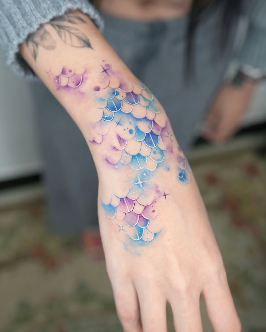 Vibrant Watercolor Mermaid Scales Tattoo