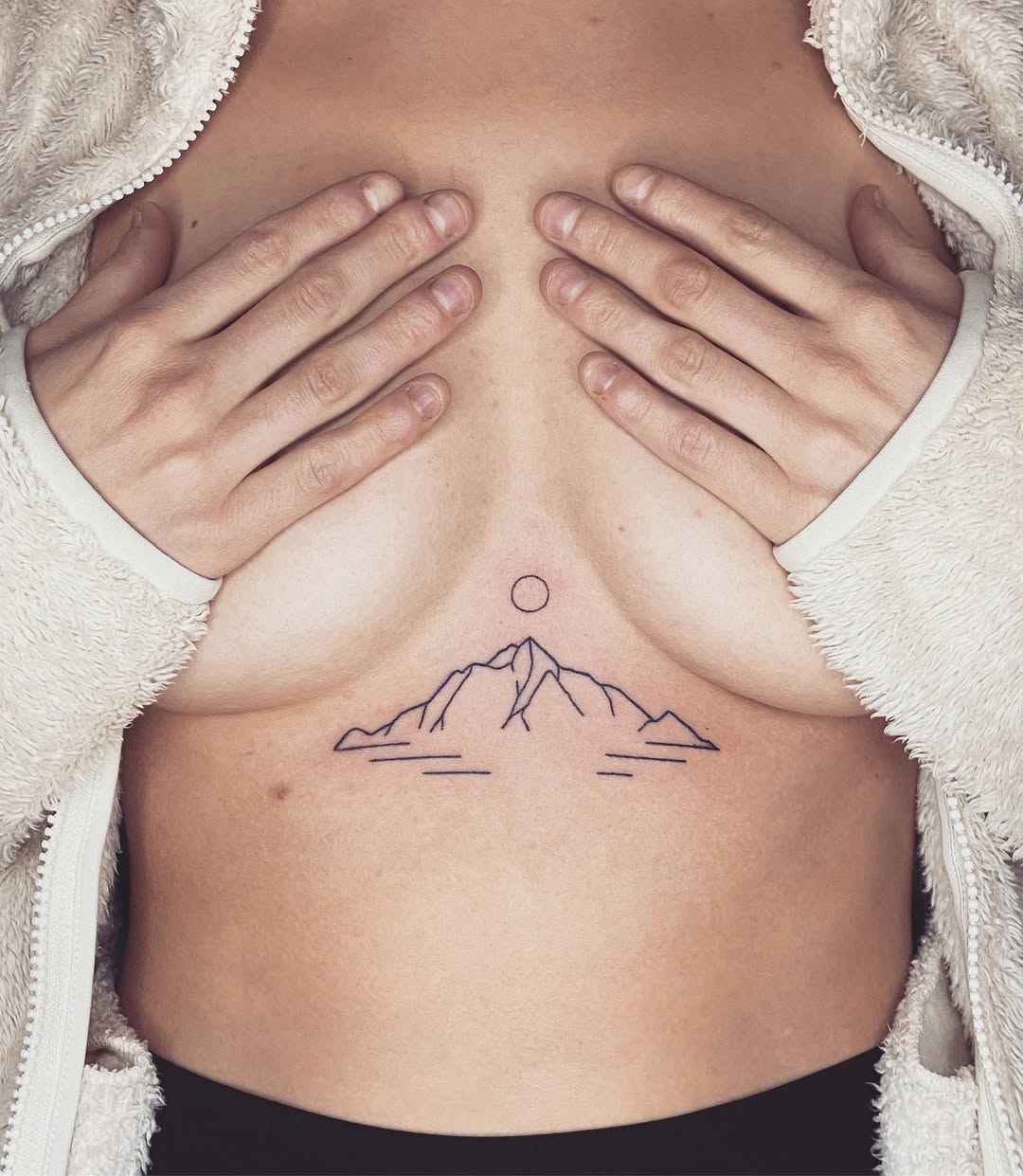 Elegant mountain tattoo with sun illustration