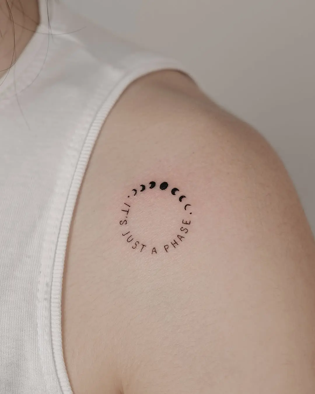 Charming moon phase tattoo with inspiring quote
