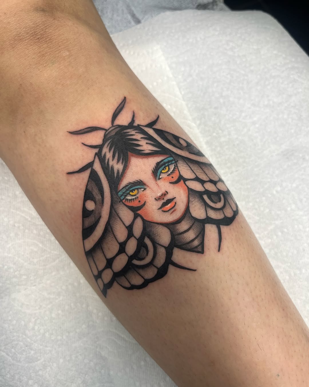 Beautiful blend of moth and feminine features