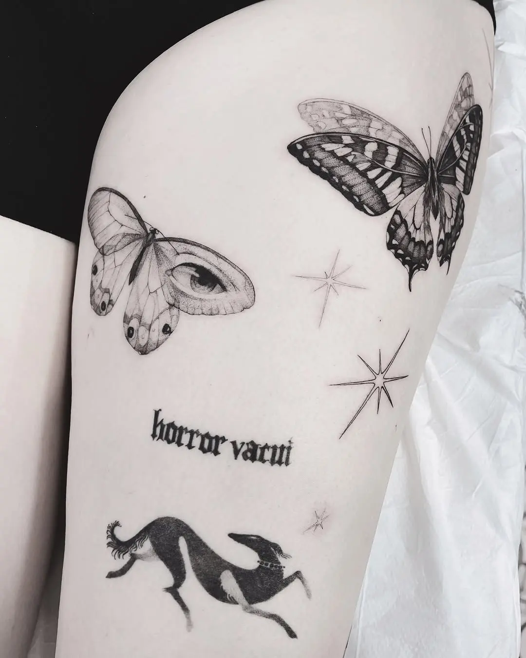 Intricate Moth and Creature Tattoos on Skin