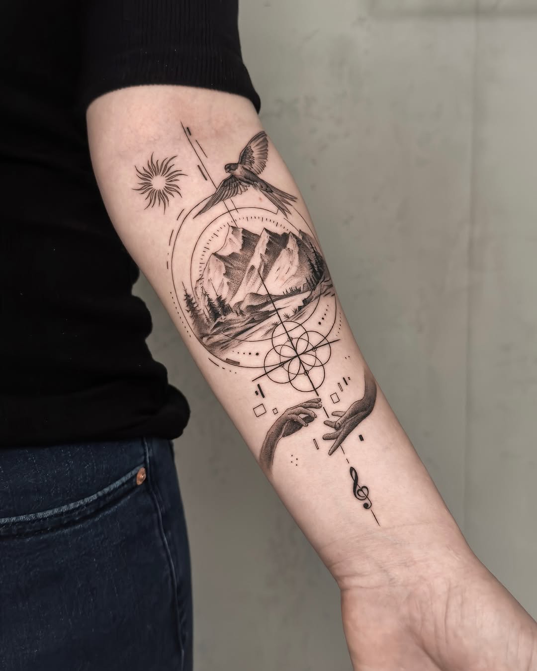 Stylish mountain tattoo with celestial elements