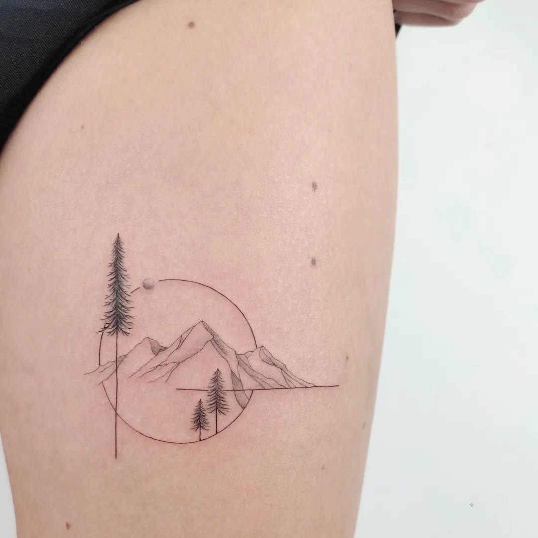 Minimalist mountain tattoo with precise lines