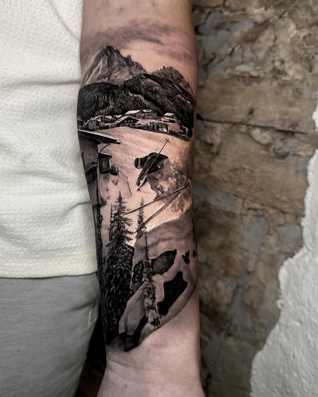 A stunning mountain ski scene tattoo