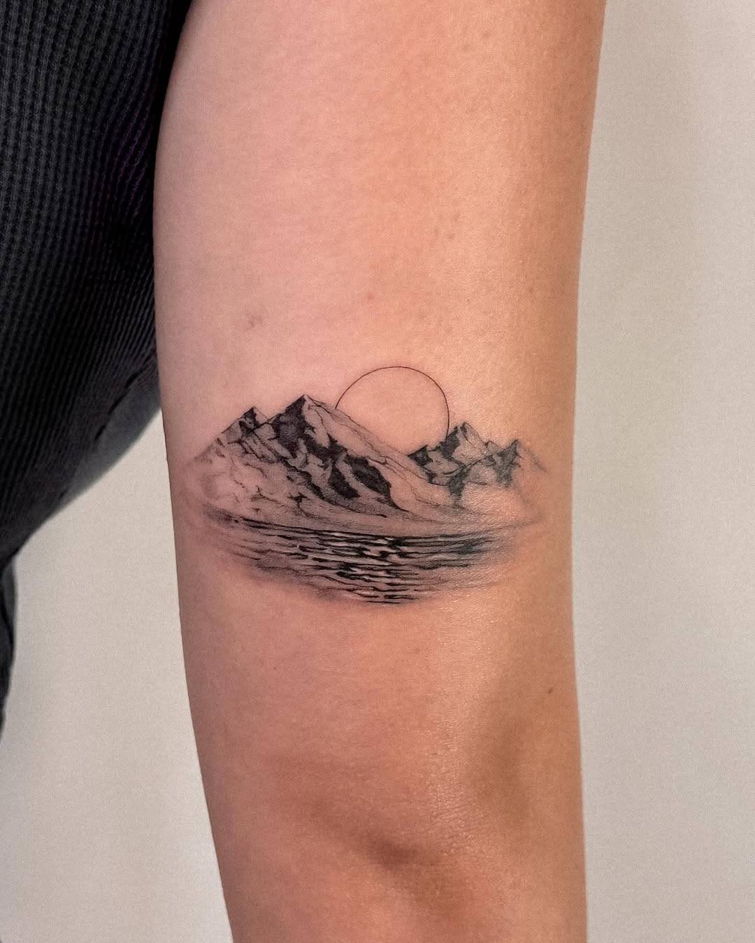 Stunning mountain and sunset tattoo design