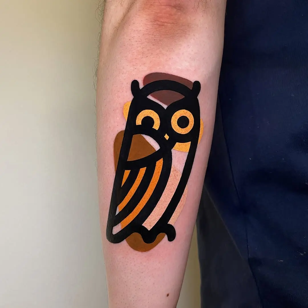 Unique minimalist owl tattoo with vibrant colors